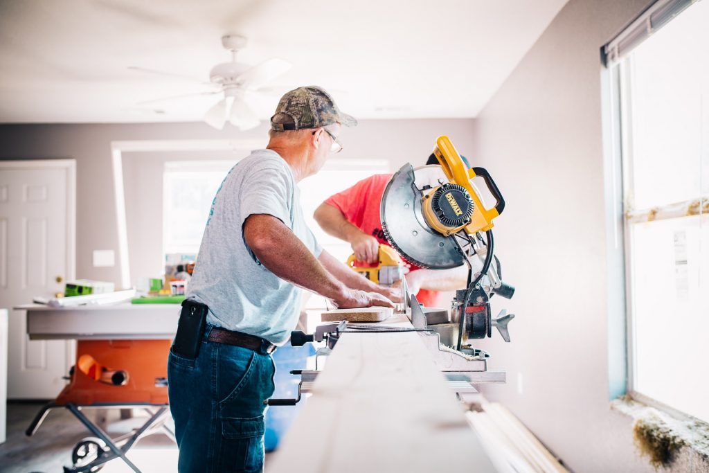 Two men doing kitchen remodeling