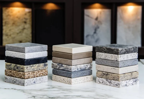 samples of quartz and other stones on top of a quartz countertop